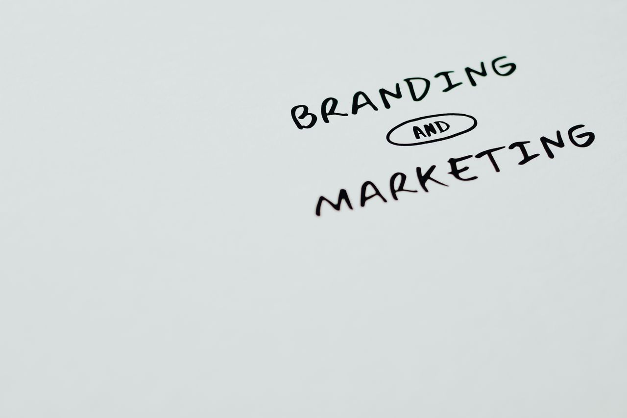 services-02 A clean, minimalist graphic showing the words Branding and Marketing on a white background, well suited to digital marketing content.